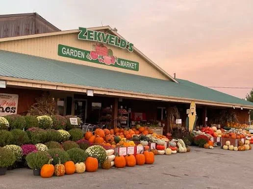Pumpkins and mums outside Zekveld's Garden Market