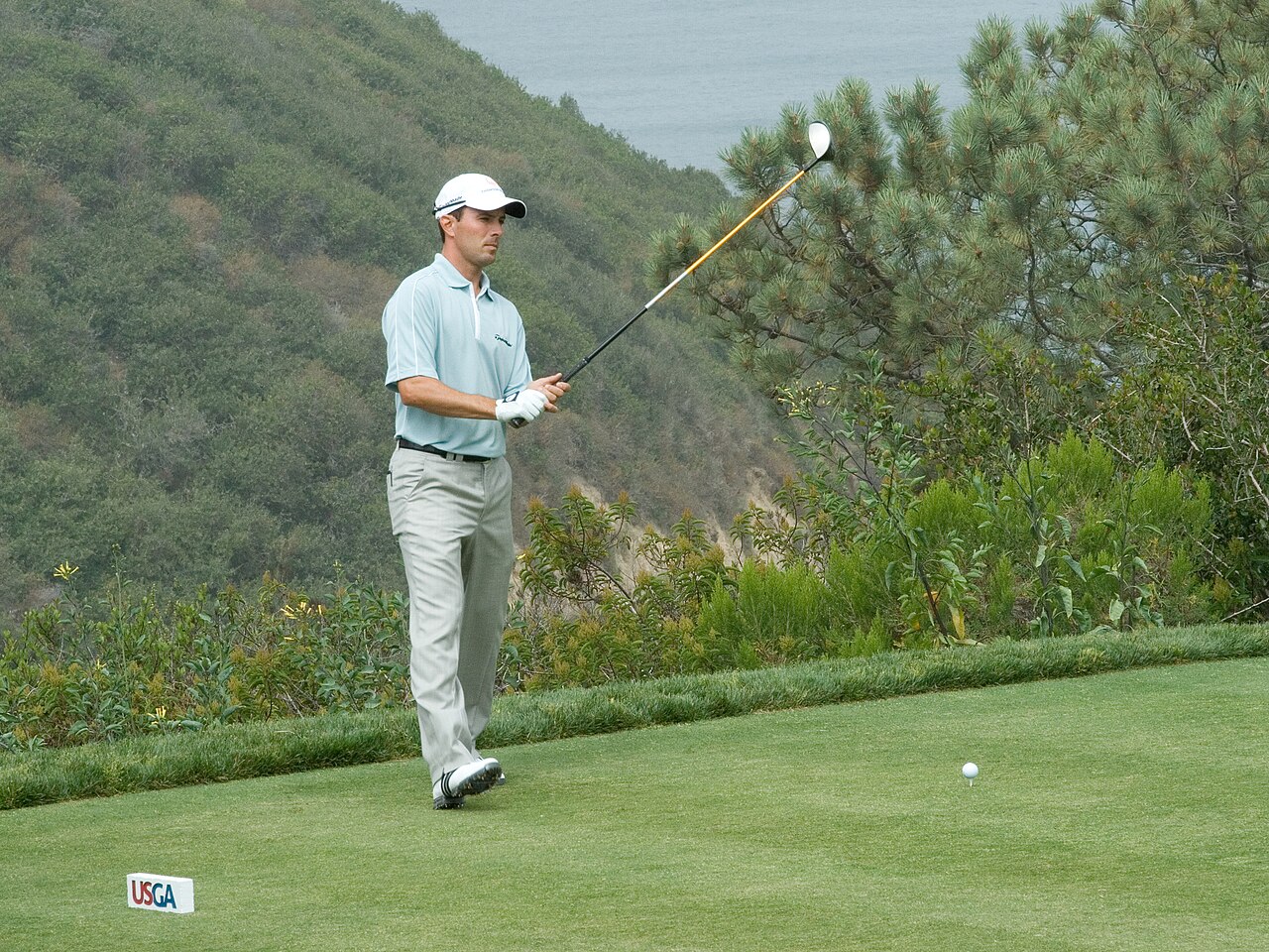 Mike Weir, wearing a cap and sunglasses, holding a golf club at Torrey Pines