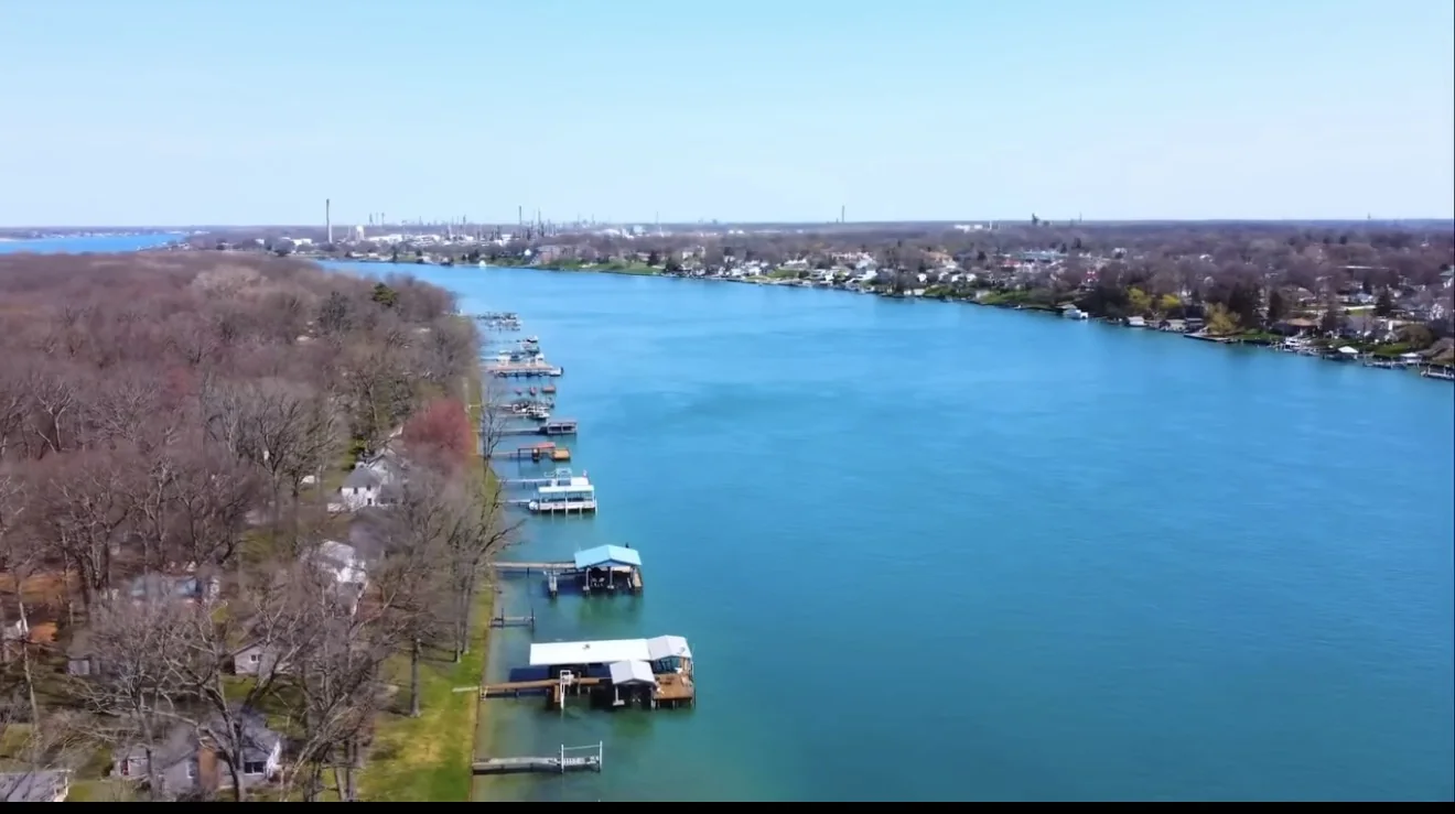 Docks along the Stag Island shore, with the St. Clair River stretching into the distance